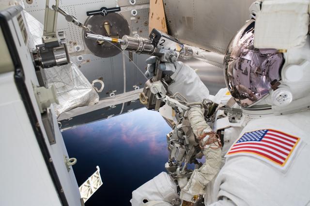 NASA astronaut Drew Feustel during a spacewalk with Expedition 55.