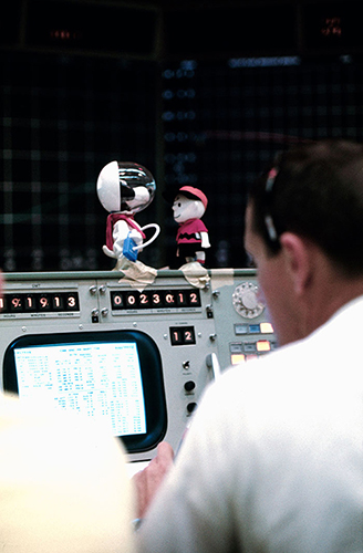 Date Created: 1969-05-18 Replicas of Snoopy and Charlie Brown, the two characters from Charles Schulz's syndicated comic strip, "Peanuts," decorate the top of a console in the Mission Operations Control Room in the Mission Control Center, Building 30, on the first day of the Apollo 10 lunar orbit mission. During lunar orbit operations, the Lunar Module will be called “Snoopy” when it is separated from the Command and Service Modules. The code words for the Command Module will be “Charlie Brown.”