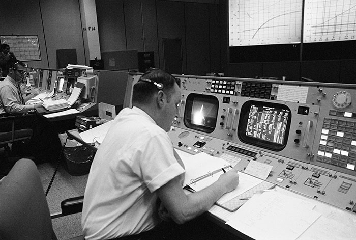 Date Created: 1968-12-21 Clifford E. Charlesworth, Apollo 8 "Green Team" flight director, is seated at his console in the Mission Operations Control Room in the Mission Control Center, Building 30, during the launch of the Apollo 8 (Spacecraft 103/Saturn 503) manned lunar orbit space mission.