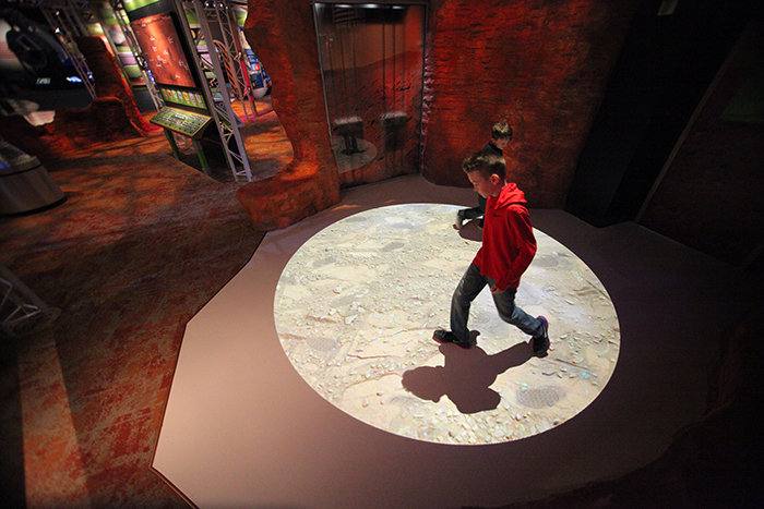 Visitors can walk on a virtual Mars landscape and leave their footprints on three different types of Mars surfaces, touch a Mars rock and sit inside an Orion simulator at Space Center Houston’s interactive Mission Mars exhibit. Visit the nonprofits Mission Mars exhibit and awaken the red planet.