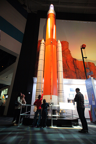 The Mission Mars exhibit gives visitors an up-close look at a magnificent 45-foot one-eighth scale model of the Space Launch System, which will be the most advanced and powerful deep space rocket ever produced. Visitors can explore what it takes to travel to Mars, the hardware that will get us to the fourth planet in our solar system and how humans may live and conduct research on the red planet in future decades.
