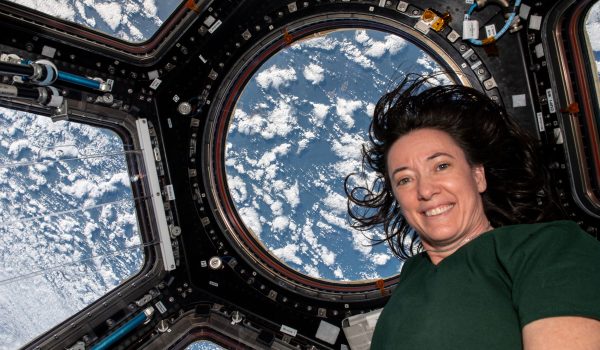 iss066e008177 (Oct. 21, 2021) --- NASA astronaut and Expedition 66 Flight Engineer Megan McArthur is pictured inside the cupola as the International Space Station orbited 263 miles above Alaska's Aleutian Islands in between the Bering Sea and the Pacific Ocean.